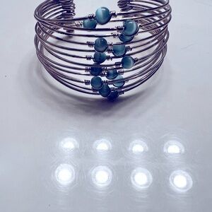 Silver and turquoise bracelet.